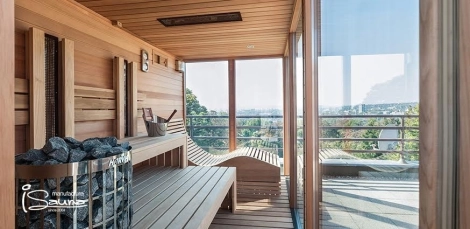 Combined outdoor sauna with relax bench